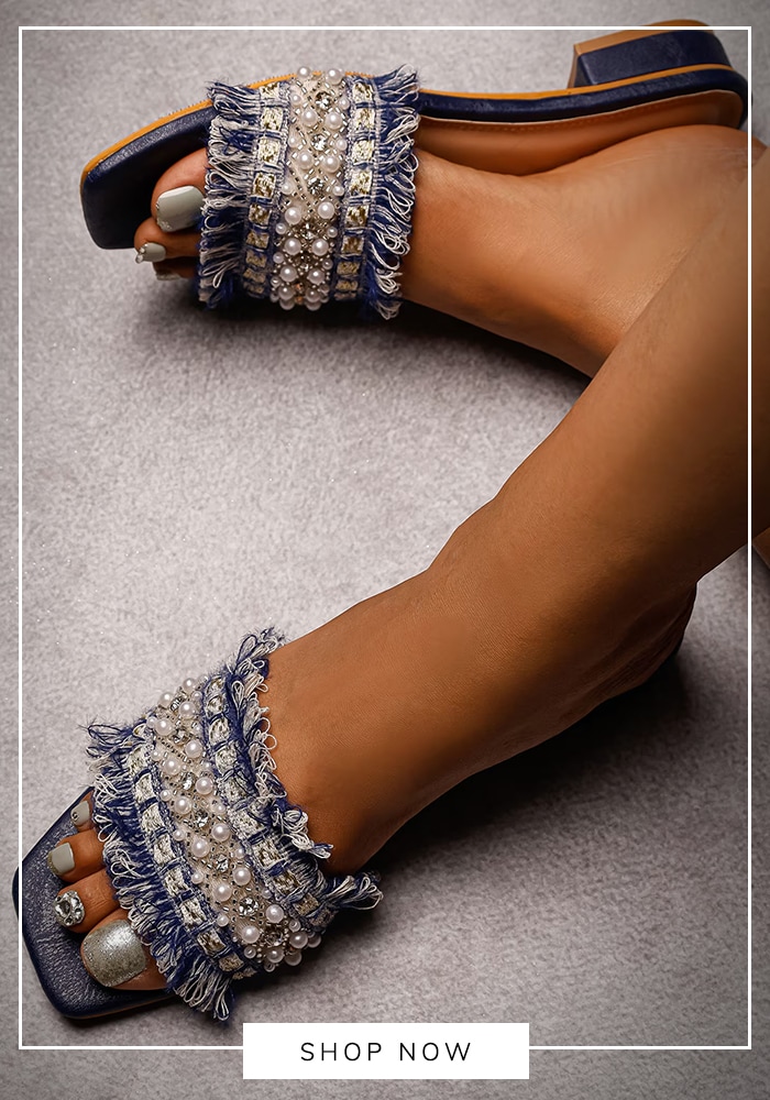 Blue taselled embroidered flats