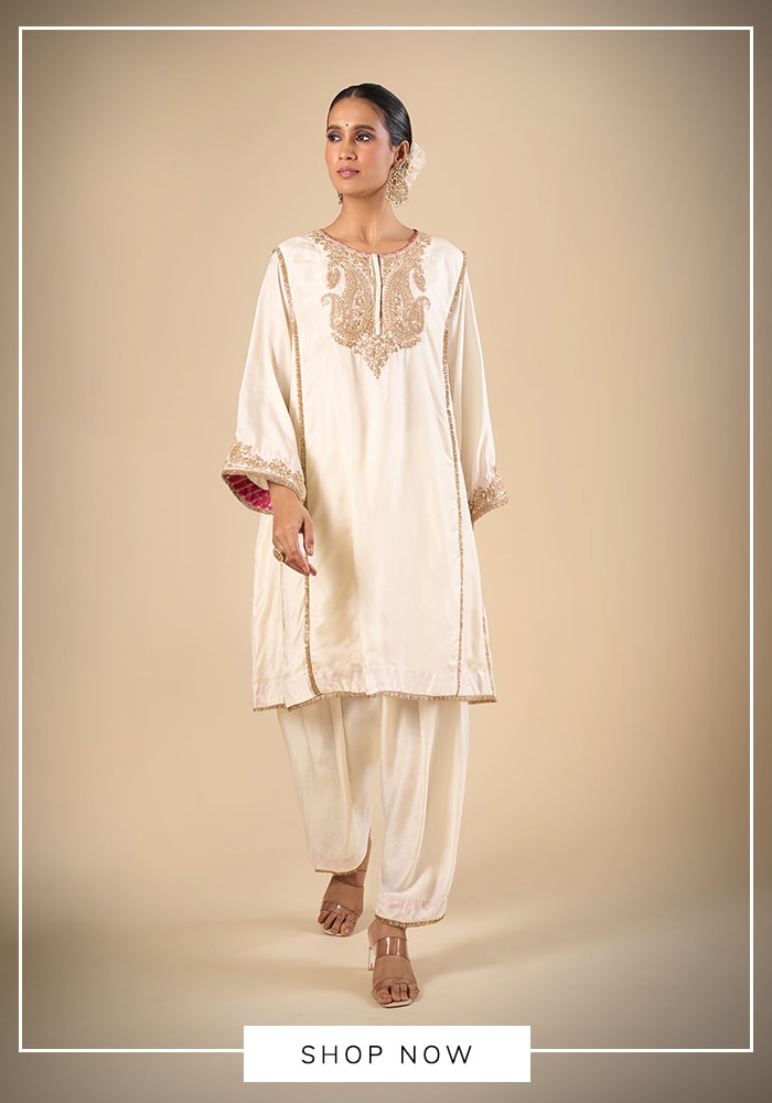 White kurta set with subtle embroidery and relaxed silhouette