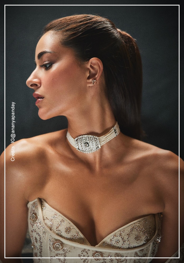 Ananya Pandey wearing a Tarun Tahiliani ivory lace and sequin concept sari with embroidered corset blouse and statement choker