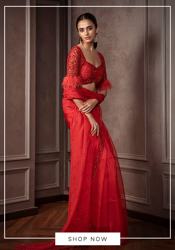 AMRIN KHAN 
Red Organza Feathers, Stones, Crystals Cutdana Embroidered Saree Blouse Set


