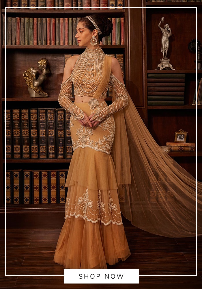 Ditch the Drape Stress: 6 Contemporary Saree Styles for Indian Brides in the USA 10 Gold mermaid saree