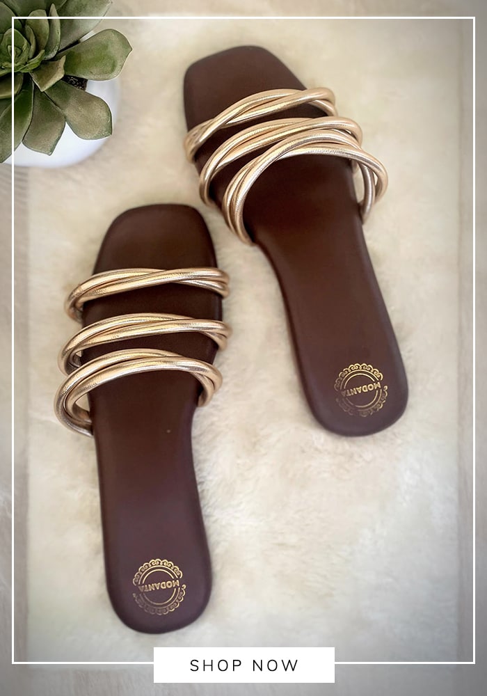 Strappy sandals paired with a flowing maxi dress for summer styling