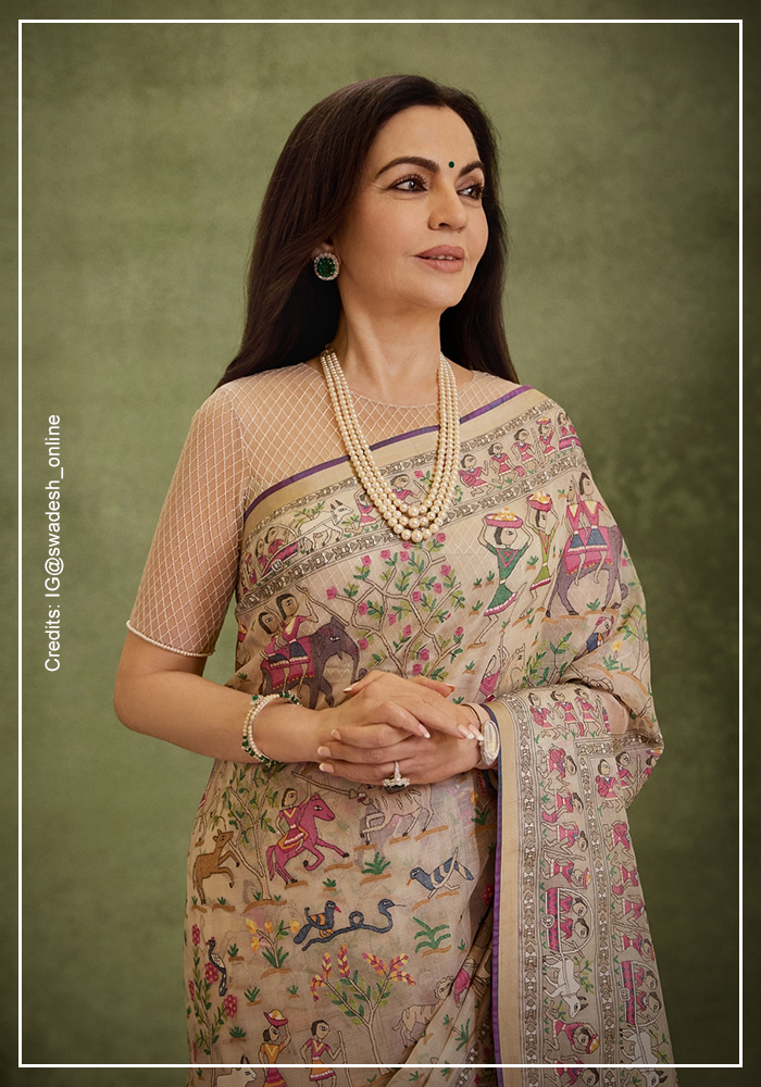 Nita Ambani in cream Jamdani saree
