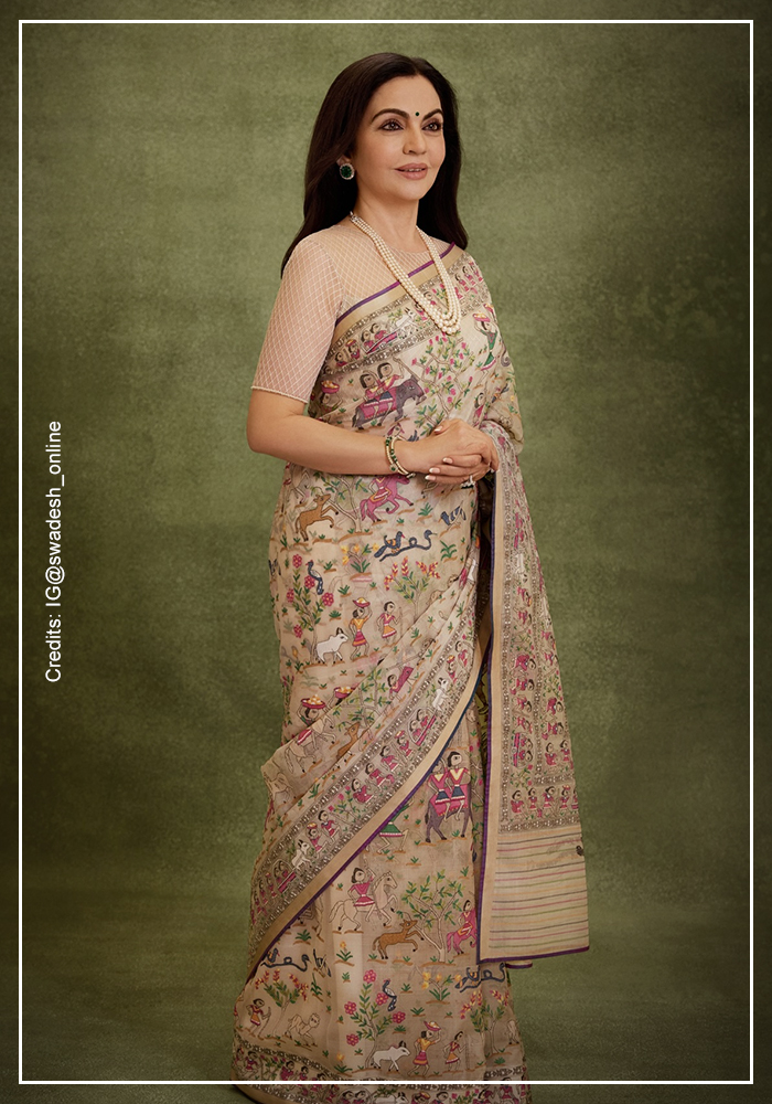 Nita Ambani wearing cream Jamdani saree at the Times100 Summit