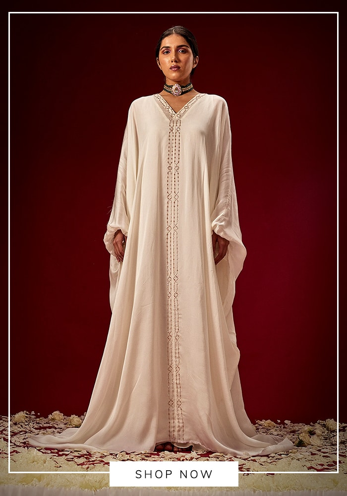 White draped kaftan for Eid celebration in the Gulf countries