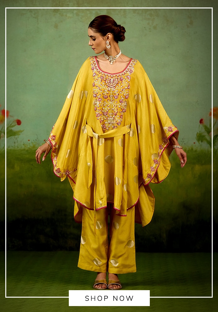 Yellow kaftan and trouser set, perfect for majlis