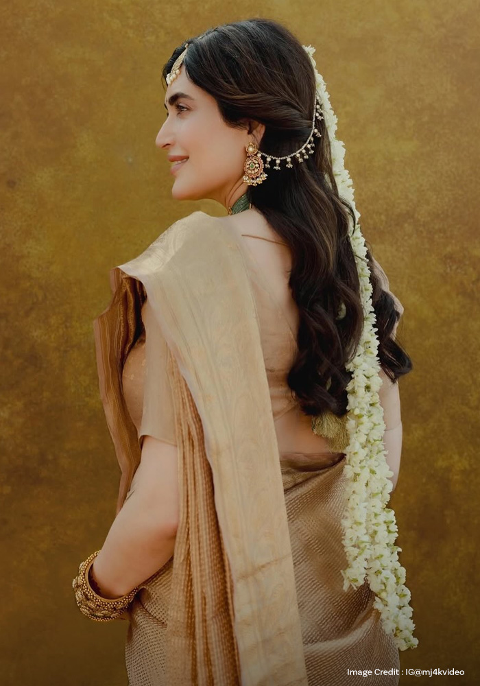 Karisma Tanna wearing gajra on her Godh Bharai