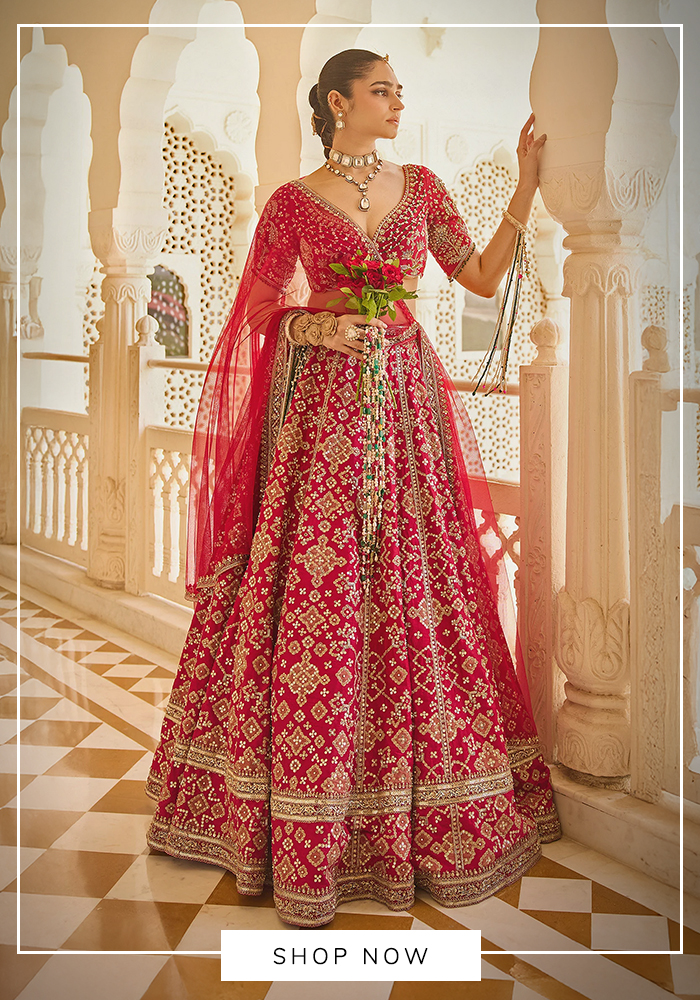 Crimson red Ridhi Mehra bridal lehenga