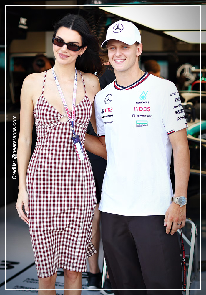 Kendall Jenner wearing checkered midi dress at Grand Prix 1