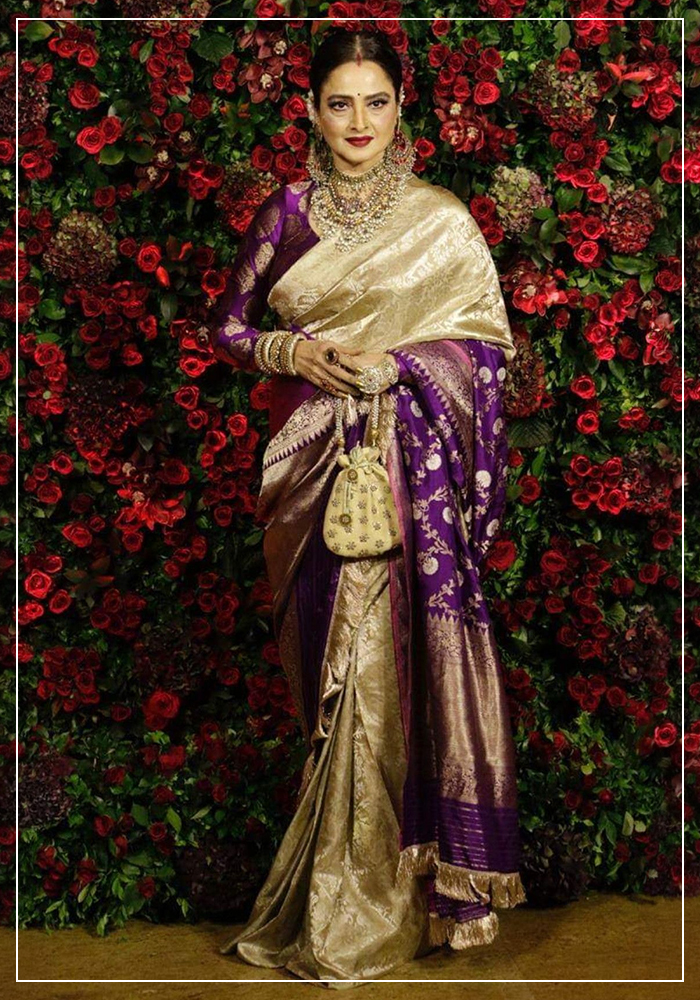 Rekha Ji wearing purple and golden saree