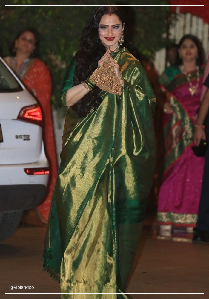 Rekha ji in bottle green saree