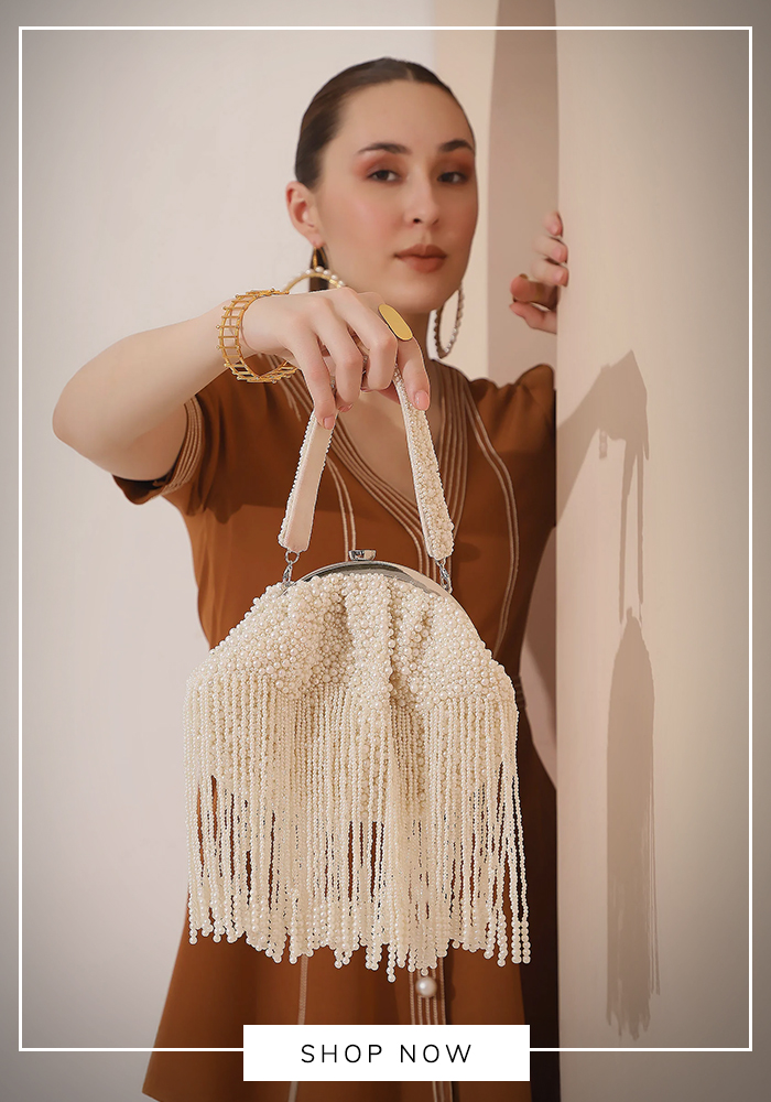 Tan Clan hand embroidered poti bag