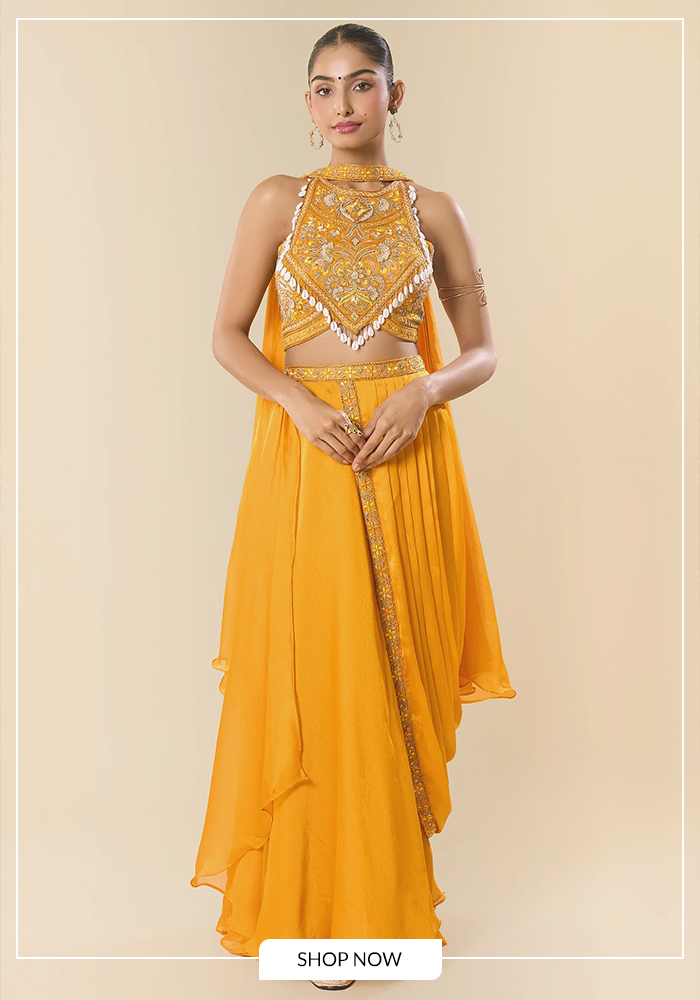 Yellow halter neck blouse and pre-draped saree set