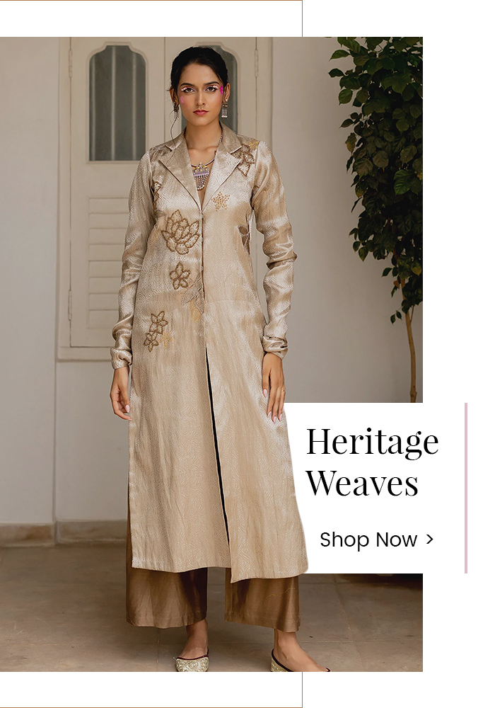 Model wearing a handcrafted heritage weave jacket set inspired by historical fiction fashion