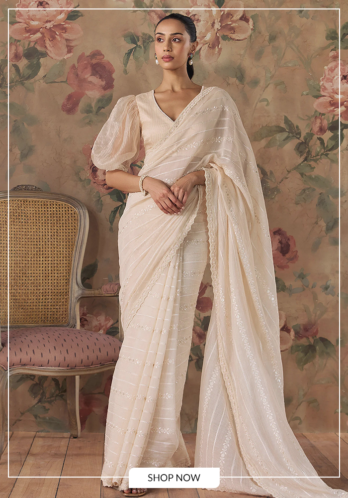 Ivory saree with puff sleeve blouse