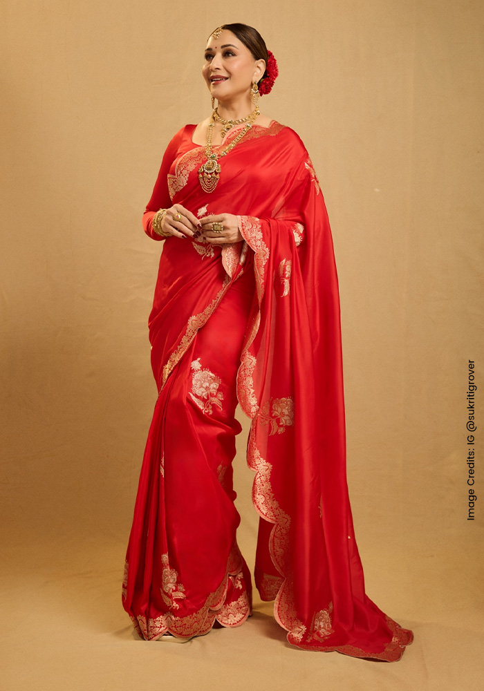 Madhuri Dixit in red Ekaya Banaras saree