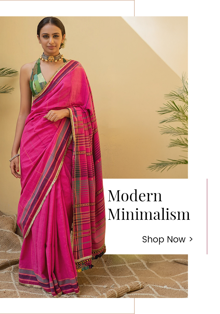 Model wearing a contemporary pink saree representing the Modern Minimalism fashion aesthetic