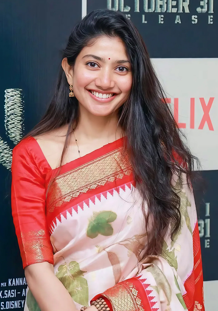 Sai Pallavi in white saree with red border