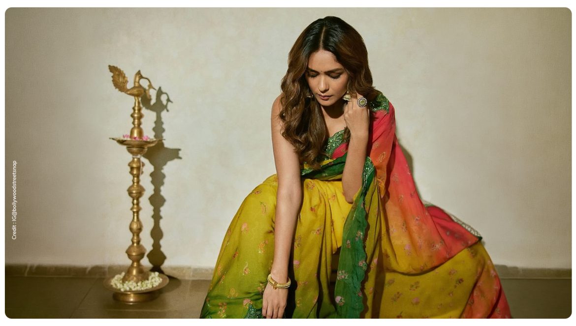 Mrunal Thakur wearing green saree