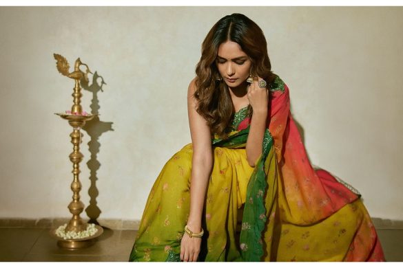 Mrunal Thakur wearing green saree