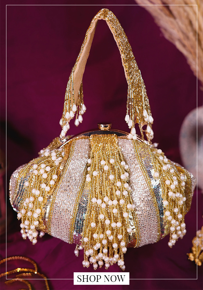Gold pearl embellished batua bag with beaded detailing for bridal and festive wear