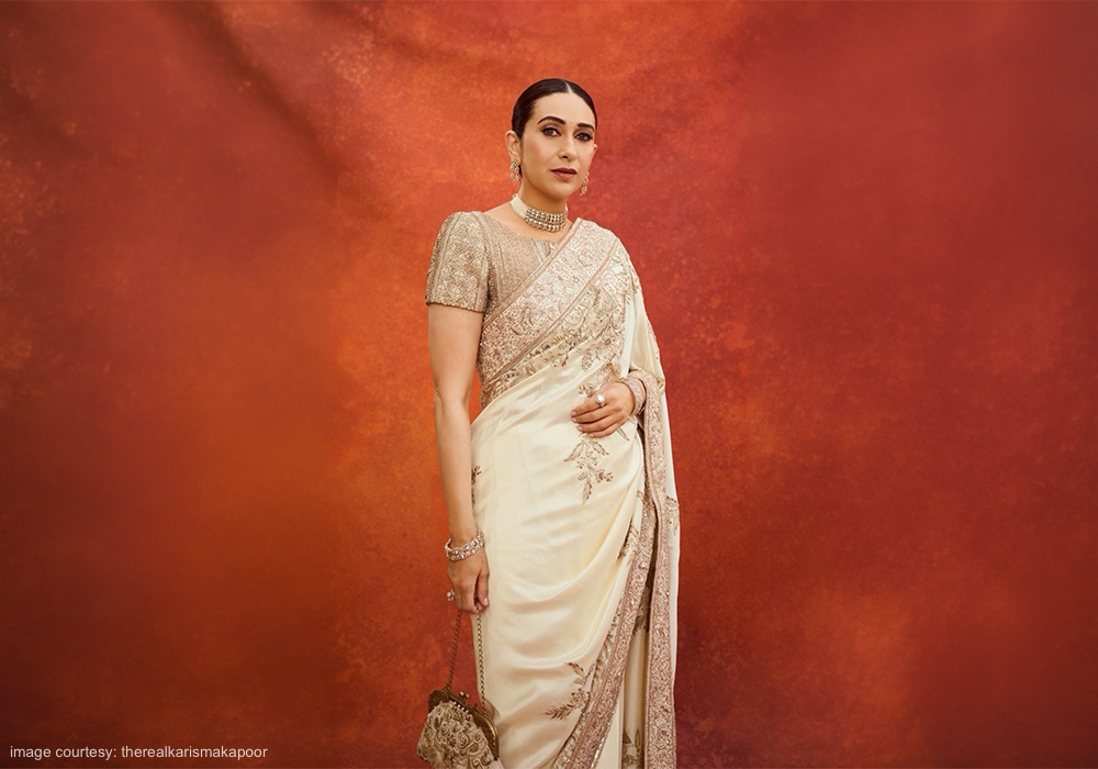 Karisma Kapoor Styles an Embroidered Batua Bag