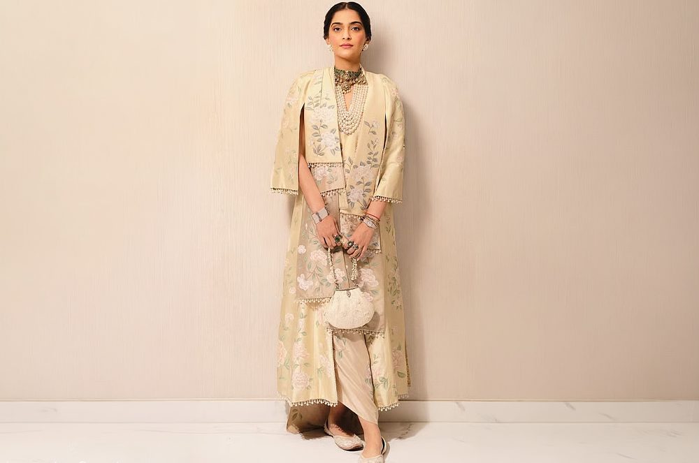 Sonam Kapoor Styles an Ivory Batua Bag