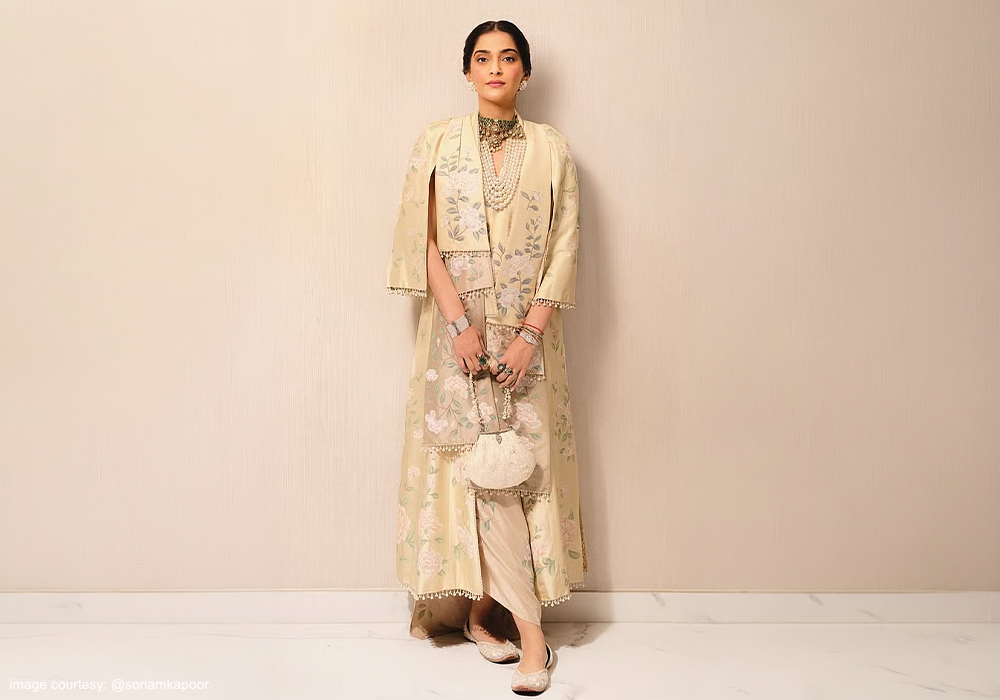 Sonam Kapoor Styles an Ivory Batua Bag