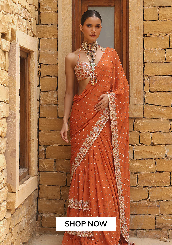 Arpita Mehta orange saree