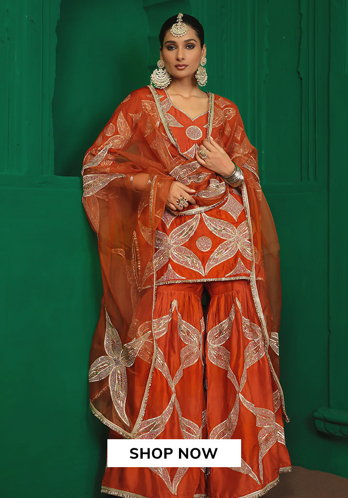Charu Makkar orange kurta sharara set