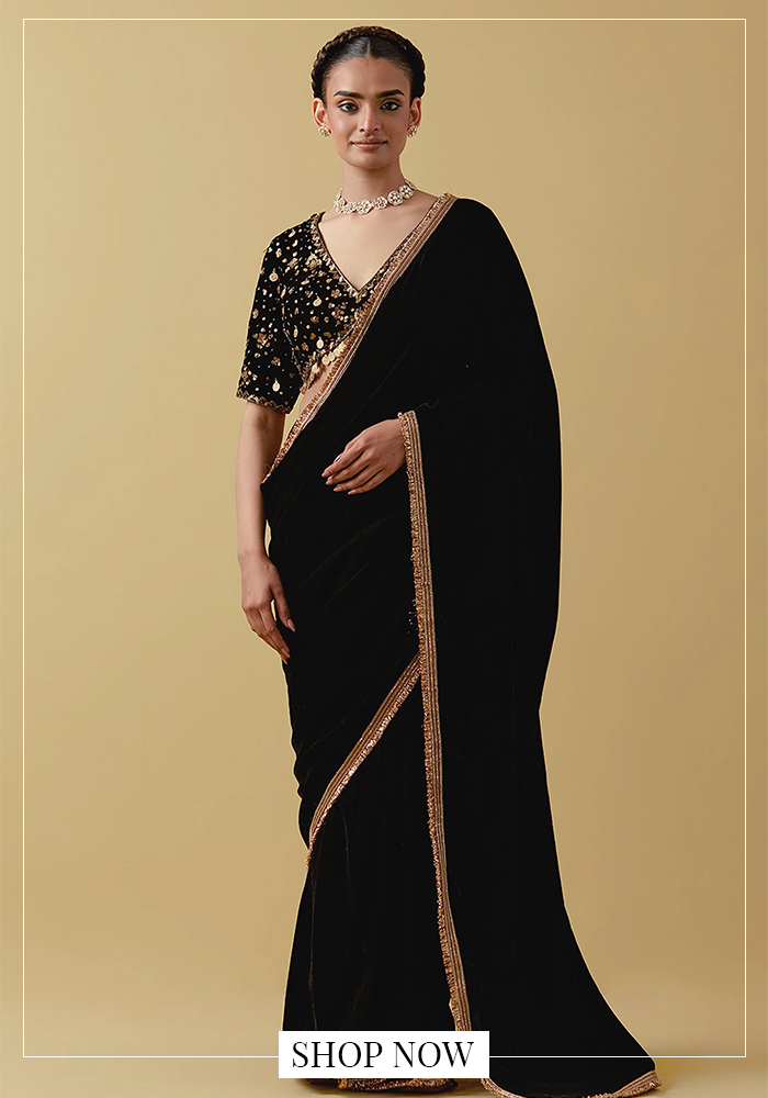 Gold embroidered black velvet saree