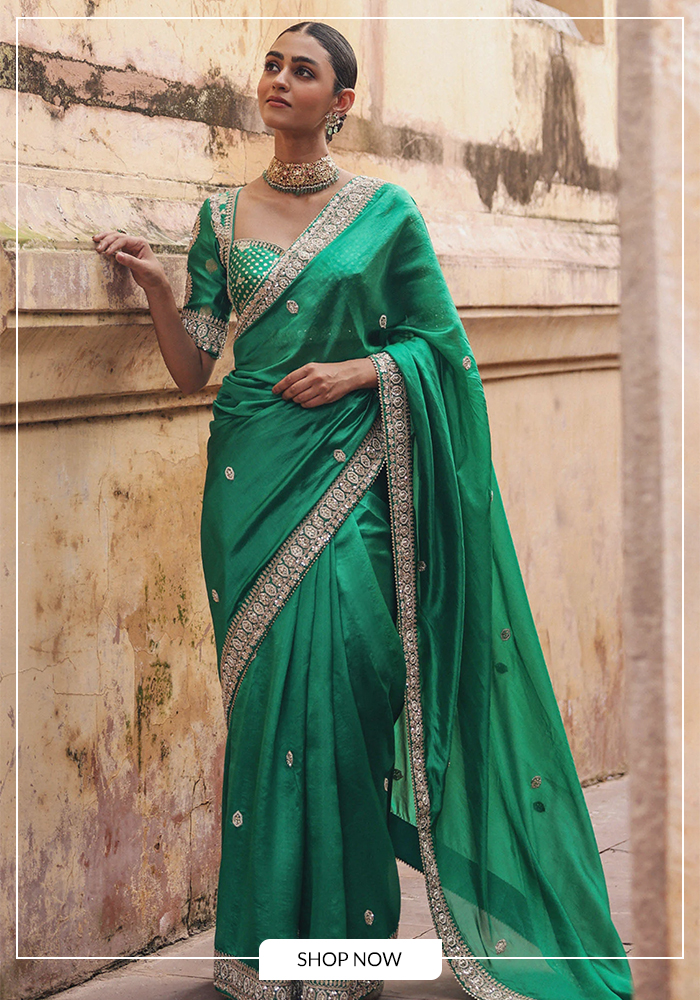 Green embroidered silk saree