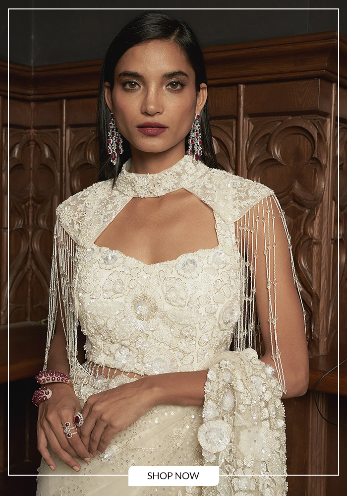 Ivory embellished cape blouse