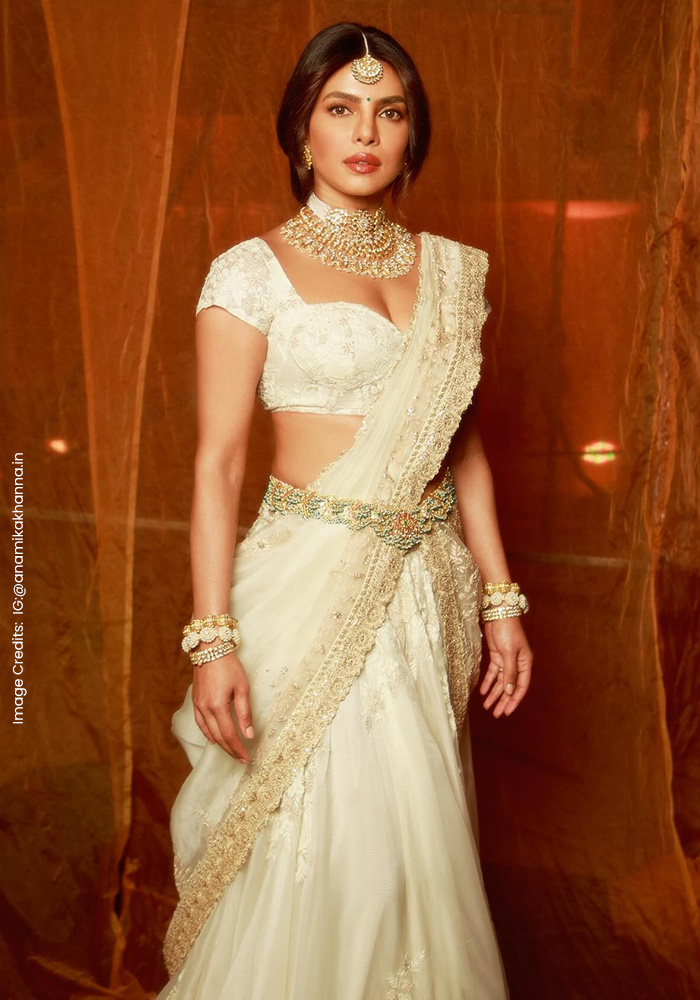 Priyanka Chopra wearing ivory Anamika Khanna lehenga saree with kamarbandh