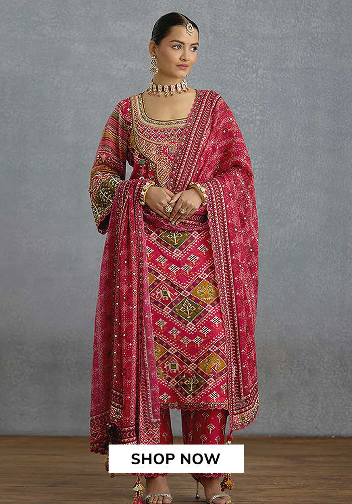 Torani red patola bridal suit