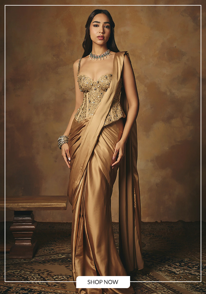 Gold pre-draped saree set with corset blouse for Nabami night