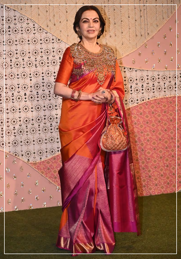Nita Ambani in orange and magenta silk saree for Ganesh Chaturthi ceebrations