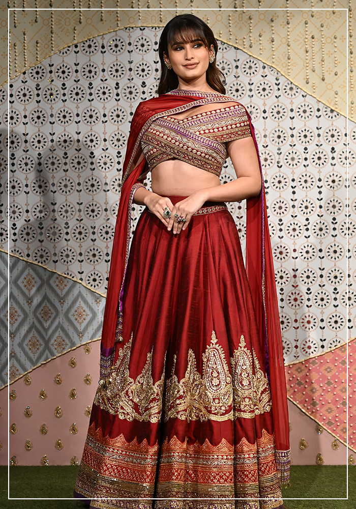 Rasha Thadani wearing red Manish Malhotra silk lehenga for Ganesh Chaturthi celebrations 2026