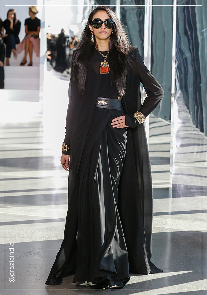Sabysachi black cape saree with logo belt at NYFW