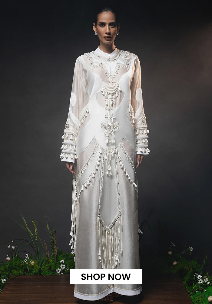 Sculptural patchwork embroidered dress for saudi engagement