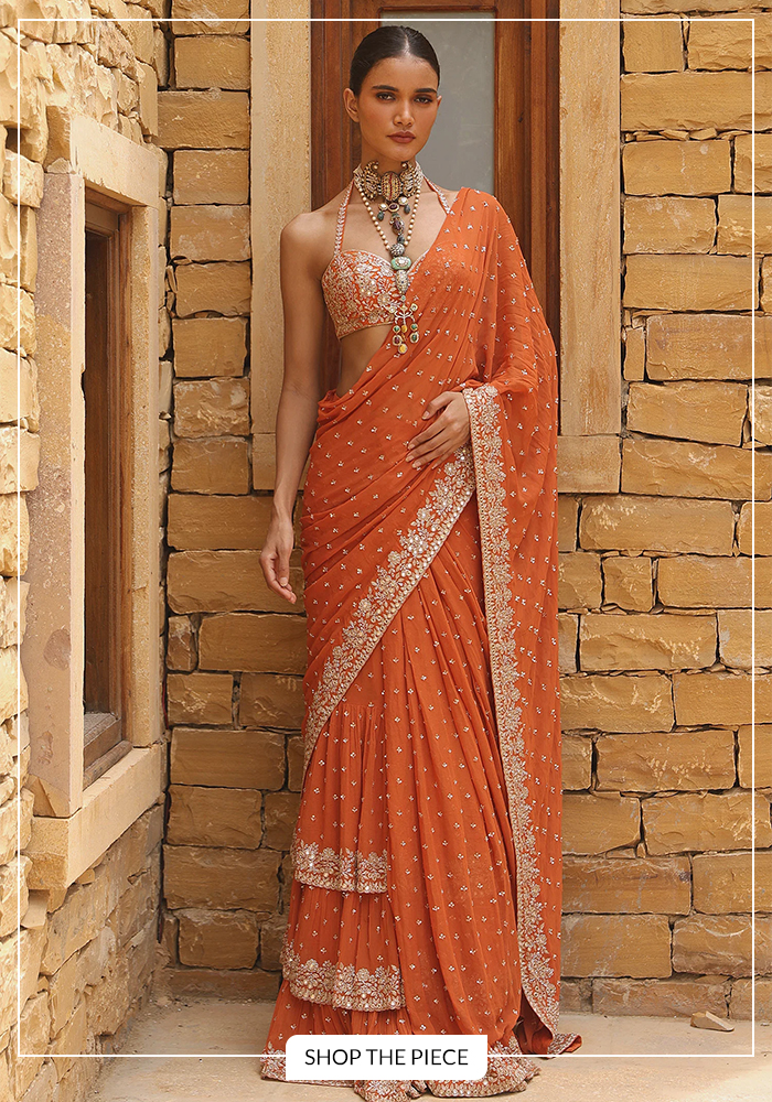 Arpita Mehta orange tiered pre-draped saree