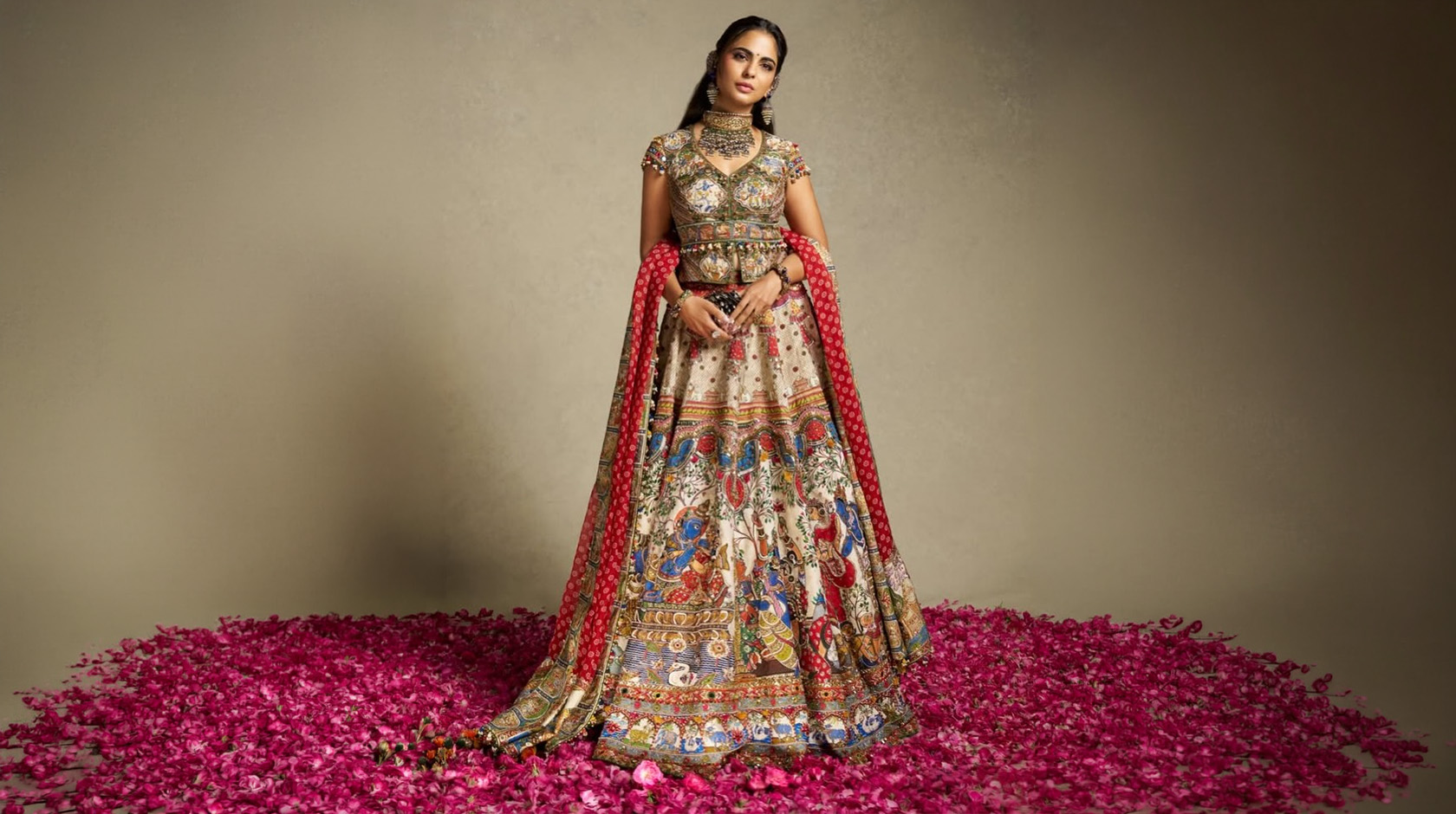 Isha Ambani wearing Torani Radha-Krishna lehenga