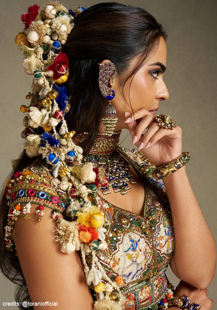 Isha Ambani wearing custom-made parindi by Tonoto